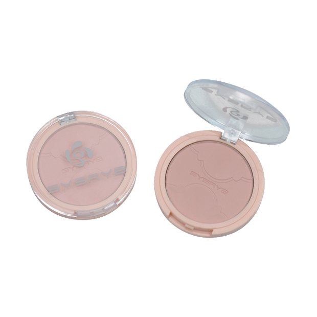 Pressed powder compact with mirror lid in nude tone