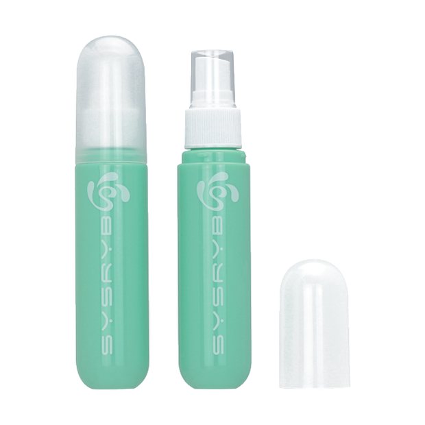 Green fine mist spray bottle with transparent cap