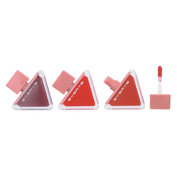 Three triangle shaped lip balm compacts with lip brush